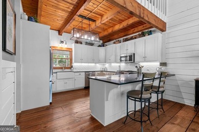 Creekside Serenity Meets Modern Luxury - Escape to this fully on Bent Tree Golf Course in Georgia - for sale on GolfHomes.com, golf home, golf lot