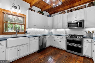 Creekside Serenity Meets Modern Luxury - Escape to this fully on Bent Tree Golf Course in Georgia - for sale on GolfHomes.com, golf home, golf lot