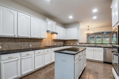 Welcome to 2130 Heather Glen Drive - Your Private Retreat in The on The Shores Country Club in Texas - for sale on GolfHomes.com, golf home, golf lot