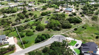 Embrace Serenity and Luxury in Rockin J Ranch - The Largest Lot on Vaaler Creek Golf Club in Texas - for sale on GolfHomes.com, golf home, golf lot