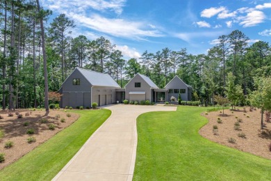 You'll find classic elegance in this transitional-style lake on Reynolds Lake Oconee - The Oconee in Georgia - for sale on GolfHomes.com, golf home, golf lot