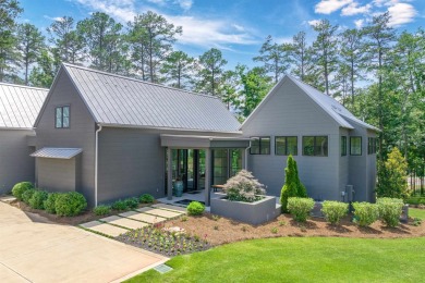 You'll find classic elegance in this transitional-style lake on Reynolds Lake Oconee - The Oconee in Georgia - for sale on GolfHomes.com, golf home, golf lot