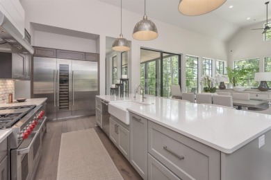 You'll find classic elegance in this transitional-style lake on Reynolds Lake Oconee - The Oconee in Georgia - for sale on GolfHomes.com, golf home, golf lot