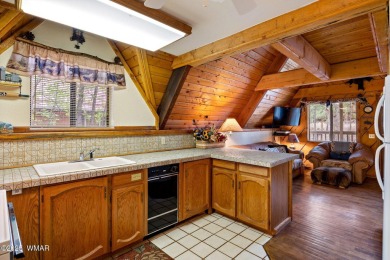 Charming chalet cabin nestled among the tall pines in Pinetop on Pinetop Lakes Golf and Country Club in Arizona - for sale on GolfHomes.com, golf home, golf lot
