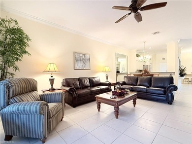 Beautifully maintained 2BR + Den / 2BA / 2-Car Garage villa with on Naples Heritage Golf and Country Club in Florida - for sale on GolfHomes.com, golf home, golf lot