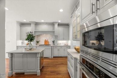 Experience refined living at 763 Heritage Arbor Drive, a on Heritage Golf Club in North Carolina - for sale on GolfHomes.com, golf home, golf lot