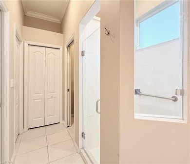 Beautifully maintained 2BR + Den / 2BA / 2-Car Garage villa with on Naples Heritage Golf and Country Club in Florida - for sale on GolfHomes.com, golf home, golf lot