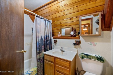 Charming chalet cabin nestled among the tall pines in Pinetop on Pinetop Lakes Golf and Country Club in Arizona - for sale on GolfHomes.com, golf home, golf lot