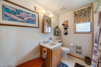 Charming chalet cabin nestled among the tall pines in Pinetop on Pinetop Lakes Golf and Country Club in Arizona - for sale on GolfHomes.com, golf home, golf lot