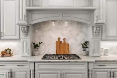 Experience refined living at 763 Heritage Arbor Drive, a on Heritage Golf Club in North Carolina - for sale on GolfHomes.com, golf home, golf lot