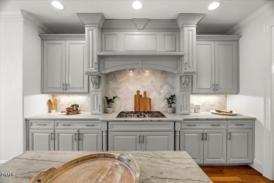 Experience refined living at 763 Heritage Arbor Drive, a on Heritage Golf Club in North Carolina - for sale on GolfHomes.com, golf home, golf lot