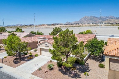 This highly sought-after 1,319 sq. ft. Lancelot model town home on Highland Falls Golf Club in Nevada - for sale on GolfHomes.com, golf home, golf lot