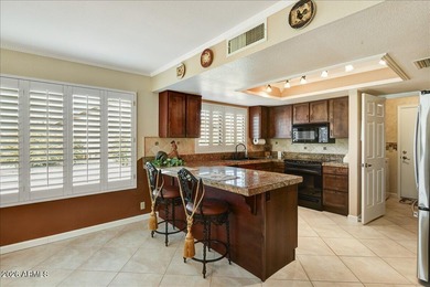 Discover this move-in-ready, popular Stratton model in on Westbrook Village Golf Club in Arizona - for sale on GolfHomes.com, golf home, golf lot