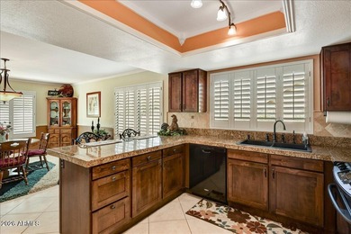 Discover this move-in-ready, popular Stratton model in on Westbrook Village Golf Club in Arizona - for sale on GolfHomes.com, golf home, golf lot