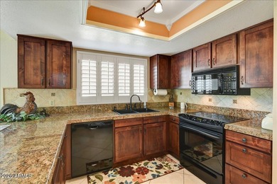 Discover this move-in-ready, popular Stratton model in on Westbrook Village Golf Club in Arizona - for sale on GolfHomes.com, golf home, golf lot