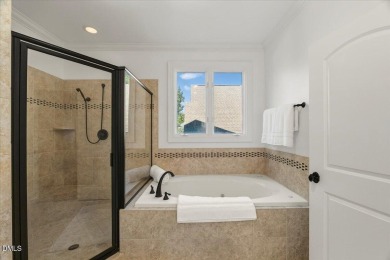 Experience refined living at 763 Heritage Arbor Drive, a on Heritage Golf Club in North Carolina - for sale on GolfHomes.com, golf home, golf lot