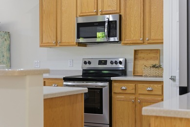 Step into this super clean, bright, and absolutely charming home on Sunriver Golf Club in Utah - for sale on GolfHomes.com, golf home, golf lot