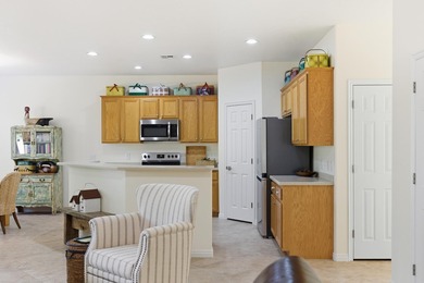 Step into this super clean, bright, and absolutely charming home on Sunriver Golf Club in Utah - for sale on GolfHomes.com, golf home, golf lot