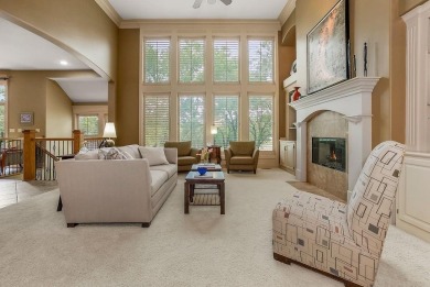 Experience luxury living in this stunning Reverse 1.5 story Don on Falcon Ridge Golf Course in Kansas - for sale on GolfHomes.com, golf home, golf lot