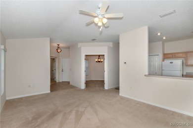 This well-maintained 2 bedroom/2 bathroom/den/2 car garage home on Twisted Oaks Golf Club in Florida - for sale on GolfHomes.com, golf home, golf lot