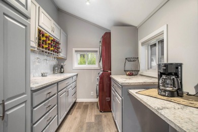 CALL BRIAN FAZEKAS : LAKEFRONT LIVING on Lyon Lake!   Welcome to on Marshall Country Club in Michigan - for sale on GolfHomes.com, golf home, golf lot