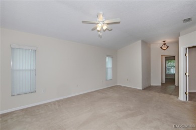 This well-maintained 2 bedroom/2 bathroom/den/2 car garage home on Twisted Oaks Golf Club in Florida - for sale on GolfHomes.com, golf home, golf lot