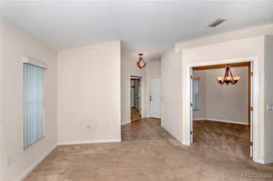 This well-maintained 2 bedroom/2 bathroom/den/2 car garage home on Twisted Oaks Golf Club in Florida - for sale on GolfHomes.com, golf home, golf lot