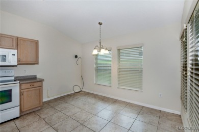 This well-maintained 2 bedroom/2 bathroom/den/2 car garage home on Twisted Oaks Golf Club in Florida - for sale on GolfHomes.com, golf home, golf lot