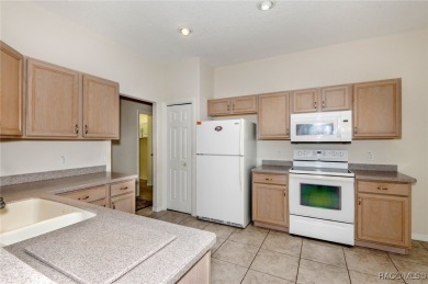 This well-maintained 2 bedroom/2 bathroom/den/2 car garage home on Twisted Oaks Golf Club in Florida - for sale on GolfHomes.com, golf home, golf lot