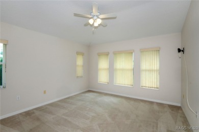 This well-maintained 2 bedroom/2 bathroom/den/2 car garage home on Twisted Oaks Golf Club in Florida - for sale on GolfHomes.com, golf home, golf lot