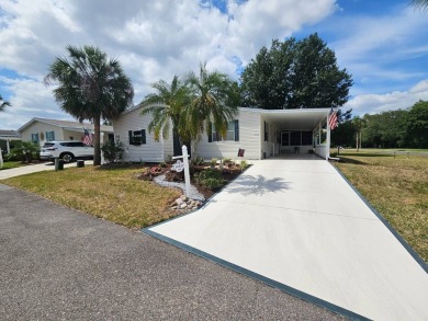 This home is on leased land! Buyers do not own the land. This on Big Cypress Golf and Country Club in Florida - for sale on GolfHomes.com, golf home, golf lot