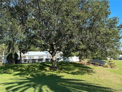 This well-maintained 2 bedroom/2 bathroom/den/2 car garage home on Twisted Oaks Golf Club in Florida - for sale on GolfHomes.com, golf home, golf lot