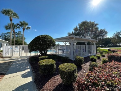 This well-maintained 2 bedroom/2 bathroom/den/2 car garage home on Twisted Oaks Golf Club in Florida - for sale on GolfHomes.com, golf home, golf lot