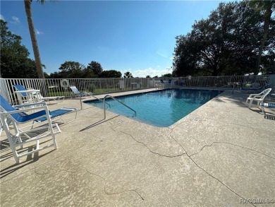 This well-maintained 2 bedroom/2 bathroom/den/2 car garage home on Twisted Oaks Golf Club in Florida - for sale on GolfHomes.com, golf home, golf lot
