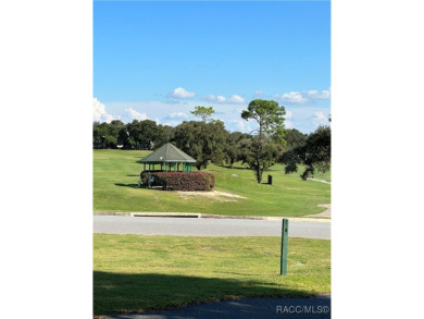 This well-maintained 2 bedroom/2 bathroom/den/2 car garage home on Twisted Oaks Golf Club in Florida - for sale on GolfHomes.com, golf home, golf lot