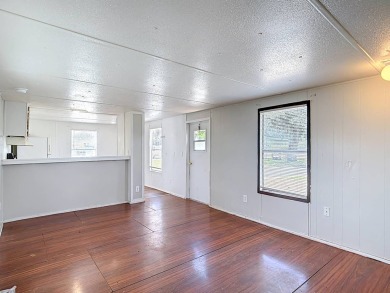 (Ver abajo en espanol)  All Ages Community - Lot rent $850 on Diamond Hill Golf and Country Club in Florida - for sale on GolfHomes.com, golf home, golf lot