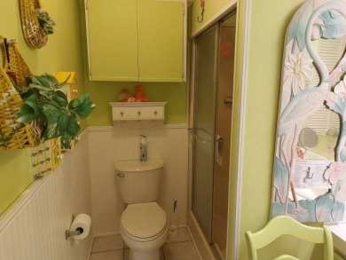 This artistic 2-bedroom 2-bathroom spacious home is located in a on Pine Lakes Country Club in Florida - for sale on GolfHomes.com, golf home, golf lot
