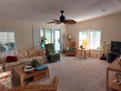 This artistic 2-bedroom 2-bathroom spacious home is located in a on Pine Lakes Country Club in Florida - for sale on GolfHomes.com, golf home, golf lot