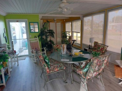 This artistic 2-bedroom 2-bathroom spacious home is located in a on Pine Lakes Country Club in Florida - for sale on GolfHomes.com, golf home, golf lot