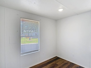 (Ver abajo en espanol)  All Ages Community - Lot rent $850 on Diamond Hill Golf and Country Club in Florida - for sale on GolfHomes.com, golf home, golf lot
