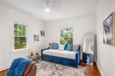 This 3-bedroom, 2-bath brick bungalow blends timeless character on College Park Municipal Golf Course in Georgia - for sale on GolfHomes.com, golf home, golf lot