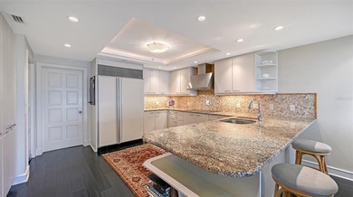 Located within the coveted Marina Bay community on Longboat Key on Longboat Key Golf Club Resort in Florida - for sale on GolfHomes.com, golf home, golf lot