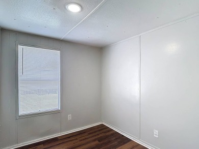 (Ver abajo en espanol)  All Ages Community - Lot rent $850 on Diamond Hill Golf and Country Club in Florida - for sale on GolfHomes.com, golf home, golf lot
