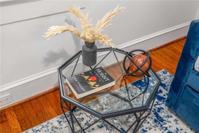 This 3-bedroom, 2-bath brick bungalow blends timeless character on College Park Municipal Golf Course in Georgia - for sale on GolfHomes.com, golf home, golf lot