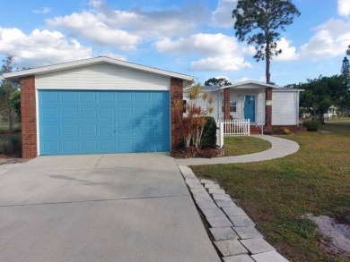 This artistic 2-bedroom 2-bathroom spacious home is located in a on Pine Lakes Country Club in Florida - for sale on GolfHomes.com, golf home, golf lot