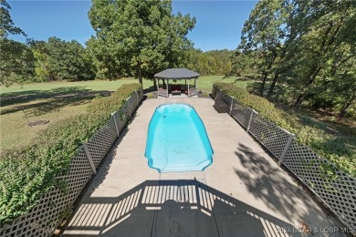 This spacious and inviting home, perfect for entertaining, sits on Indian Rock Golf Club in Missouri - for sale on GolfHomes.com, golf home, golf lot