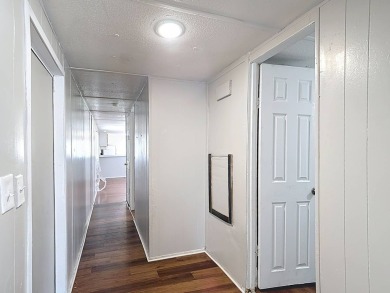 (Ver abajo en espanol)  All Ages Community - Lot rent $850 on Diamond Hill Golf and Country Club in Florida - for sale on GolfHomes.com, golf home, golf lot