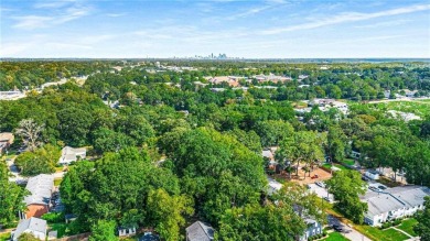 This 3-bedroom, 2-bath brick bungalow in Historic College Park on College Park Municipal Golf Course in Georgia - for sale on GolfHomes.com, golf home, golf lot