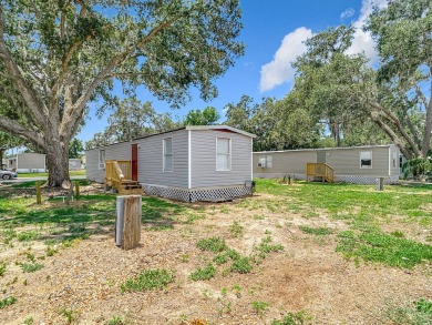 (Ver abajo en espanol)  All Ages Community - Lot rent $850 on Diamond Hill Golf and Country Club in Florida - for sale on GolfHomes.com, golf home, golf lot