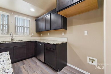 This inviting home features soaring vaulted ceilings upgraded on Hunters Point Golf Club in Idaho - for sale on GolfHomes.com, golf home, golf lot